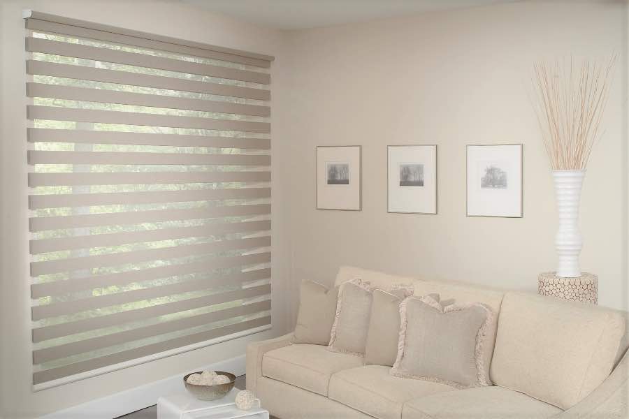 Zebra shades give you a unique combination of light control and style that benefits your Chicago home. Zebra shade allows filtered light into a living room