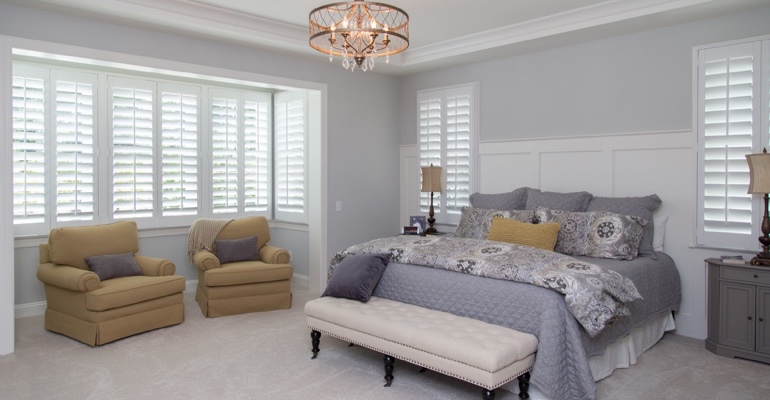 interior shutters offer subtle style. Interior shutters in Chicago bedroom.