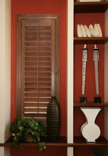 You can even match your wood shutters with shelving. Chicago wood shutter shelving