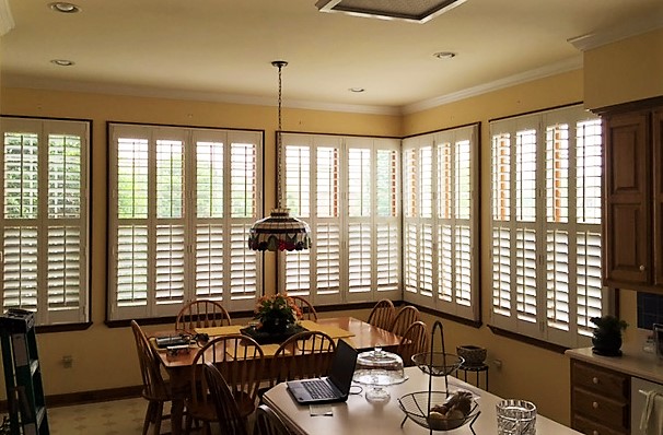 Polywood plantation shutters work well on oversized windows. Plantation shutters in kitchen
