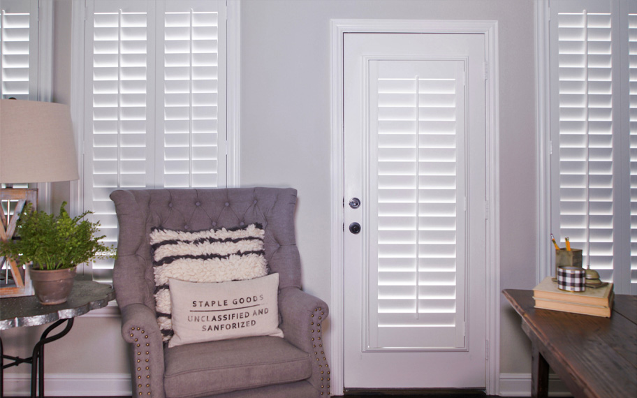 Interior shutters are beautiful and durable window treatments for glass doors in Chicago. Polywood shutters on a door