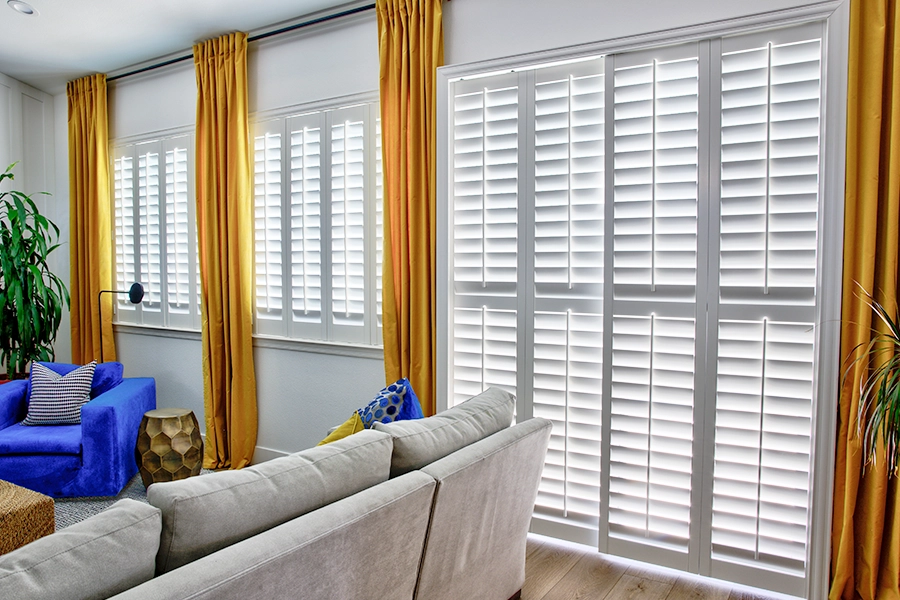 All you need is a duster and damp cloth to get your beautiful Polywood shutters shining again. White Polywood shutters on living room windows